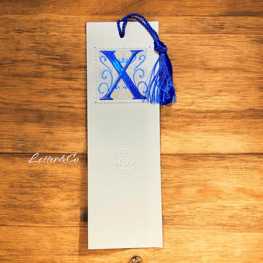 Lesezeichen Bookmark Monogramm X und Quaste in blau